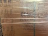 a stack of boxes that are wrapped in plastic