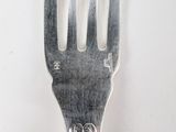 a fork that is sitting on top of a table