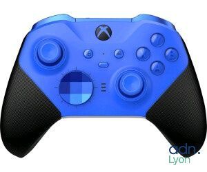 a close up of a blue controller on a white background