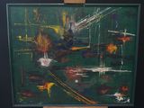a painting that is on a easel in a room