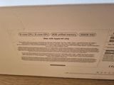the box is open on the table with the back of it