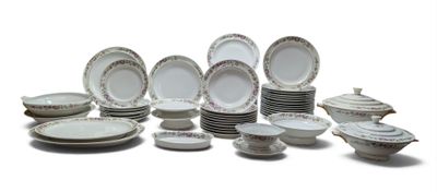 many different types of plates and bowls on this table