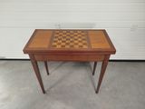 an image of a small table with a chess board on top of it