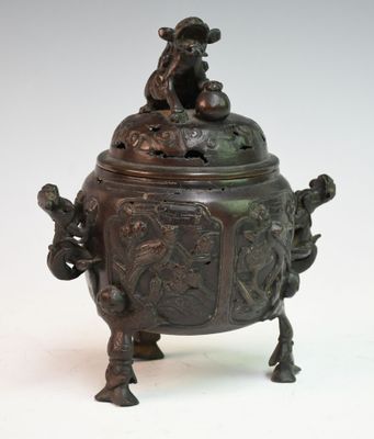 an image of a bronze incense pot with a monkey on top of it