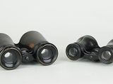 pair of binoculars on white background photo