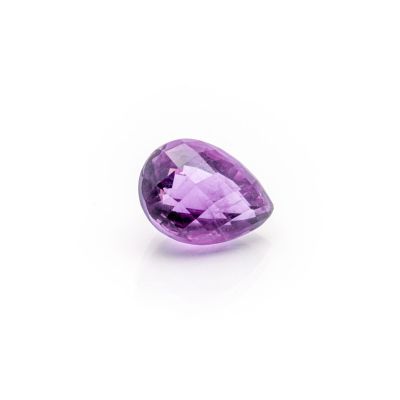 a purple amethorate gems on a white background
