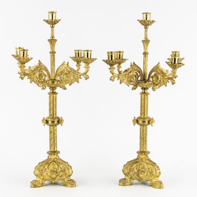 pair of antique brass candelabs