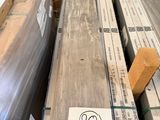 several boxes of wood are stacked on top of a pallet