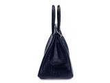 a black handbag on a white background with a white background