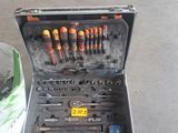 many tools in a tool case on the floor
