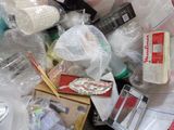 a lot of items that are in a trash can