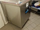 an image of a kitchen with a refrigerator and a dishwasher