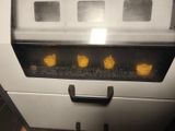 a close up of a machine that has four burners on it