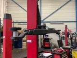 a picture of a garage with a lot of tools on the floor