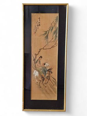 an oriental painting of a man riding a horse on a mountain