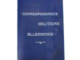 a blue book with white writing on it sitting on top of a table