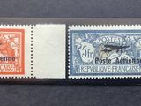 two stamps with a picture of a man and a woman on them