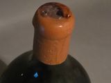 a bottle of wine that is sitting on a table