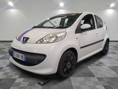 a picture of a small white car parked in a garage