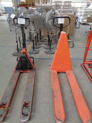 many pallets that are sitting in a warehouse