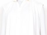 a mannequin wearing a white shirt and black pants