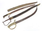 several different types of weapons are displayed on a white surface