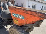 a tractor that is parked in the parking lot