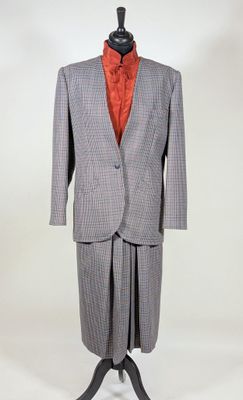 an image of a suit on a mannequin stand