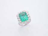 an emerald and diamond ring