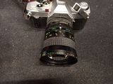 a camera that is sitting on the ground with a camera attached to it