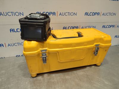 a yellow case with a camera on top of it