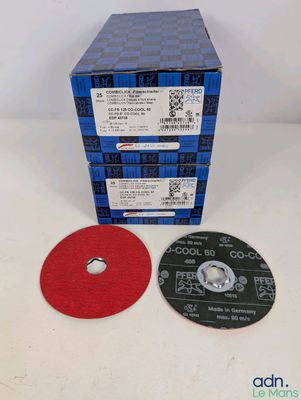 une boîte contenant un disque, surmontée d'un disque rouge
