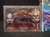 two games on the table, one of which is a hero and one of which is a villain