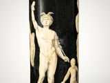 black and white vase with an image of a man holding a child