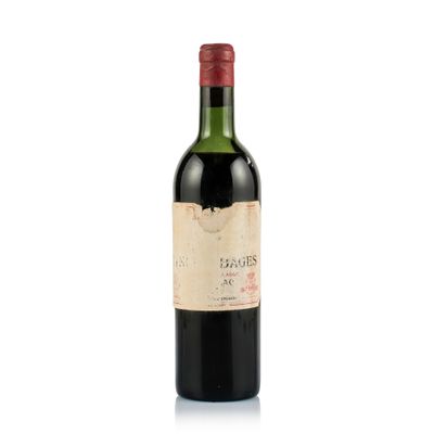 bottle of red wine with a red cap on a white background