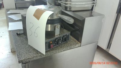 a machine that is sitting on a counter in a kitchen