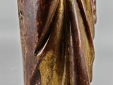 a close up of a statue of a man with a hat on his head