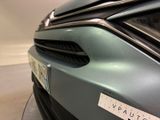 a close up of a car with a sticker on it