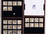 a display case with a lot of coins inside of it