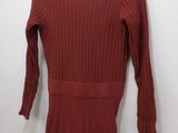 an image of a red dress hanging on a hanger