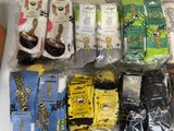 many pairs of socks that are sitting on a table
