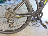 a close up of a bike with a chain attached to it