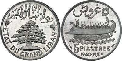 a close up of a coin with an image of a boat on it