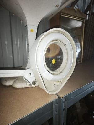 a white light that is on top of a shelf