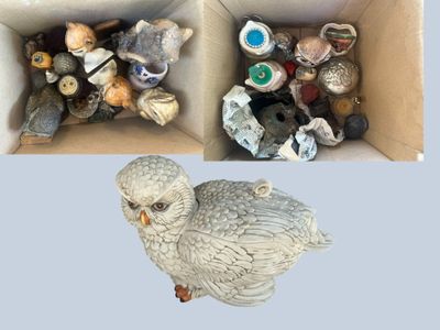 two boxes filled with different types of stuffed animals