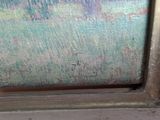 a picture of a painting on a window sill