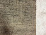 a close up of a piece of jute cloth on a table