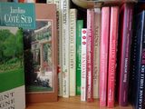 many books that are on the shelf together