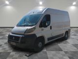 a picture of a white van parked in a room
