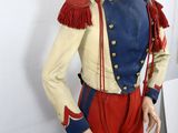a mannequin of a man dressed in a military uniform